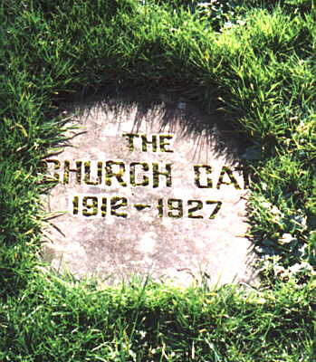 The gravestone of Tom - the church cat