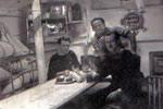 Three of Denys Powell's friends on HMS Gambia one Christmas. Unfortunately I do not know their names or the year. Photo kindly submitted by Anita Neads.