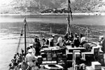 HMS Wrangler anchored off Samos with medical supplies of stores and food for the village, August 1953. Image from Imperial War Museums, A32639 HMS Wrangler anchored off Samos with medical supplies of stores and food for the village, August 1953. Image from Imperial War Museums, A32639