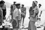 Lady Mountbatten talking to members of a Naval fire party at Argostoli, August 1953. Image from Imperial War Museums, A32641