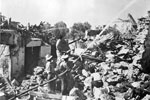 Men of the Royal Navy and Marines working in the areas devastated by the earthquake, August 1953. Image from Imperial War Museums, A32659