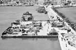 At Zante supplies are disgorged from landing craft on to the jetty, August 1953. Image from Imperial War Museums, A32689