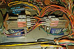 The selector assembly relays from the rear. The start relay (R5) is closest to the latch solenoid on the left, the select pulse latch relay (R1) is the one closest to the wiring loom on the right. The selector assembly relays from the rear. The start relay (R5) is closest to the latch solenoid on the left, the select pulse latch relay (R1) is the one closest to the wiring loom on the right.