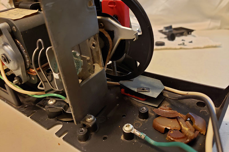 >Broken film claw cam on a Technicolor Instant Movie projector 280