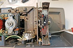 With the lens, lamp and cover removed the entire mechanism can be cleaned.