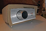 Technicolor Instant Movie Projector 580. The disassembly of this projector is the same for any other Technicolor Instant Movie Projector. As with any electrical device, ensure the projector is unplugged from the mains before opening it.