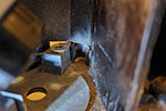 The spring in position. This is from an 800 model projector and I had to loosen the lamp holder to take the photograph.