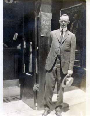 Ray H. Weisbrod posing in front of the Orpheum Theater in Terre Haute